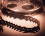 Photo: Johnathan via jonjonphenomenon. It's a film reel, with film out in brown, black and white shade.
