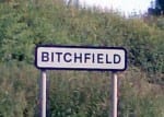 A photo of the village of Bitchfield's street sign.