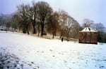 Lincoln's Arboretum in the snow with the bandstand in the corner.